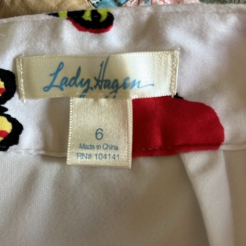 Lady Hagen white skorts with white undershorts and a butterfly pattern. Size 6. - Picture 11 of 12